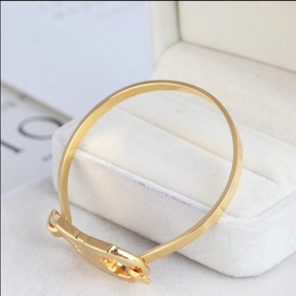 Tory Burch Gold Gemini Petite Hinge Bangle Bracelet - Picture 2 of 8